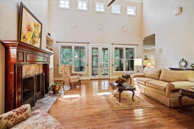 Nestled on a picturesque tree-lined street, this expansive home on Charleston National Golf Club in South Carolina - for sale on GolfHomes.com, golf home, golf lot