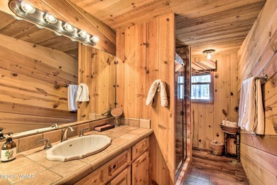 Unbelievable views of the 8th green from the gorgeous deck on White Mountain Country Club in Arizona - for sale on GolfHomes.com, golf home, golf lot