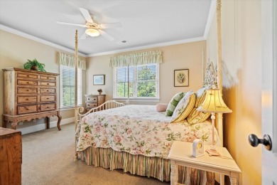 Nestled on a picturesque tree-lined street, this expansive home on Charleston National Golf Club in South Carolina - for sale on GolfHomes.com, golf home, golf lot