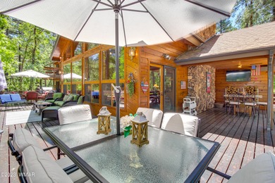 Unbelievable views of the 8th green from the gorgeous deck on White Mountain Country Club in Arizona - for sale on GolfHomes.com, golf home, golf lot