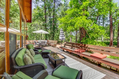 Unbelievable views of the 8th green from the gorgeous deck on White Mountain Country Club in Arizona - for sale on GolfHomes.com, golf home, golf lot