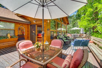 Unbelievable views of the 8th green from the gorgeous deck on White Mountain Country Club in Arizona - for sale on GolfHomes.com, golf home, golf lot