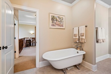 Nestled on a picturesque tree-lined street, this expansive home on Charleston National Golf Club in South Carolina - for sale on GolfHomes.com, golf home, golf lot