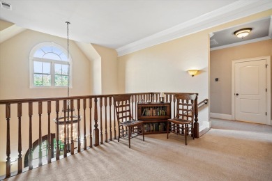 Nestled on a picturesque tree-lined street, this expansive home on Charleston National Golf Club in South Carolina - for sale on GolfHomes.com, golf home, golf lot