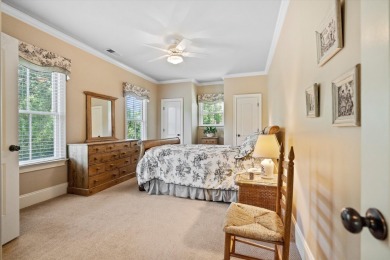 Nestled on a picturesque tree-lined street, this expansive home on Charleston National Golf Club in South Carolina - for sale on GolfHomes.com, golf home, golf lot