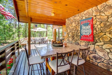 Unbelievable views of the 8th green from the gorgeous deck on White Mountain Country Club in Arizona - for sale on GolfHomes.com, golf home, golf lot