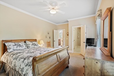 Nestled on a picturesque tree-lined street, this expansive home on Charleston National Golf Club in South Carolina - for sale on GolfHomes.com, golf home, golf lot