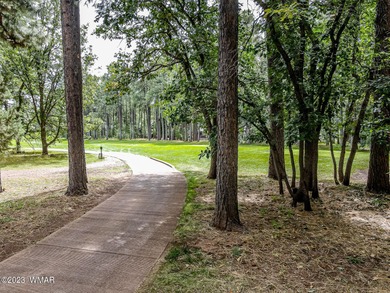 Unbelievable views of the 8th green from the gorgeous deck on White Mountain Country Club in Arizona - for sale on GolfHomes.com, golf home, golf lot