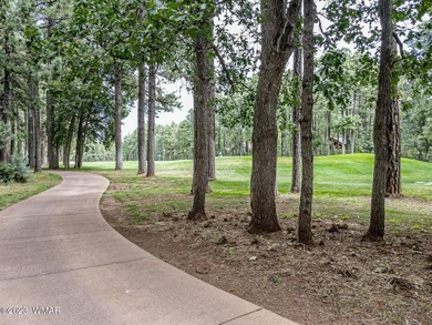 Unbelievable views of the 8th green from the gorgeous deck on White Mountain Country Club in Arizona - for sale on GolfHomes.com, golf home, golf lot