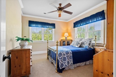 Nestled on a picturesque tree-lined street, this expansive home on Charleston National Golf Club in South Carolina - for sale on GolfHomes.com, golf home, golf lot
