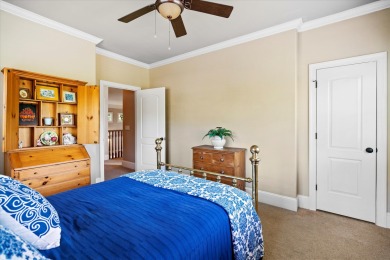 Nestled on a picturesque tree-lined street, this expansive home on Charleston National Golf Club in South Carolina - for sale on GolfHomes.com, golf home, golf lot