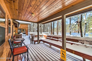 Unbelievable views of the 8th green from the gorgeous deck on White Mountain Country Club in Arizona - for sale on GolfHomes.com, golf home, golf lot