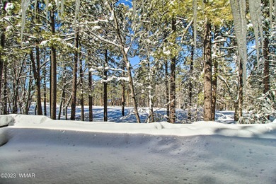 Unbelievable views of the 8th green from the gorgeous deck on White Mountain Country Club in Arizona - for sale on GolfHomes.com, golf home, golf lot