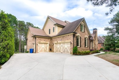 Exquisite timeless feature of shakes and bricks/stones house is on Hamilton Mill Golf Club in Georgia - for sale on GolfHomes.com, golf home, golf lot