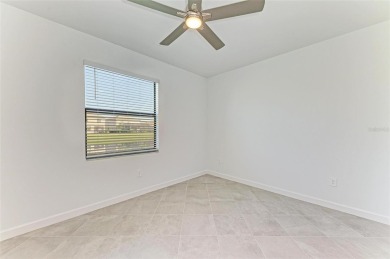 Exquisite Florida Resort Living in Lorraine Lakes. Discover on Lakewood National Golf Club in Florida - for sale on GolfHomes.com, golf home, golf lot