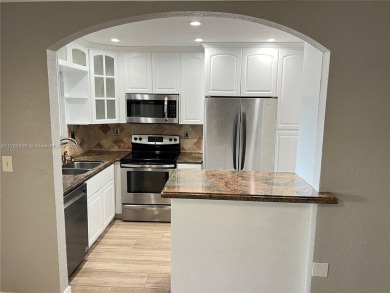 Stunning 3-bedroom, 2-bath lakefront townhouse offering a on Miccosukee Golf and Country Club in Florida - for sale on GolfHomes.com, golf home, golf lot