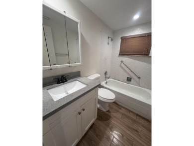 Two-bedroom, 2 bath, end unit villa in the Seville section of on Kings Point Golf - Executive in Florida - for sale on GolfHomes.com, golf home, golf lot