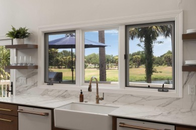 Situated on a beautiful lagoon overlooking the Wild Dunes Harbor on Wild Dunes Harbor Golf Resort in South Carolina - for sale on GolfHomes.com, golf home, golf lot