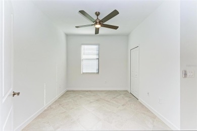 Exquisite Florida Resort Living in Lorraine Lakes. Discover on Lakewood National Golf Club in Florida - for sale on GolfHomes.com, golf home, golf lot