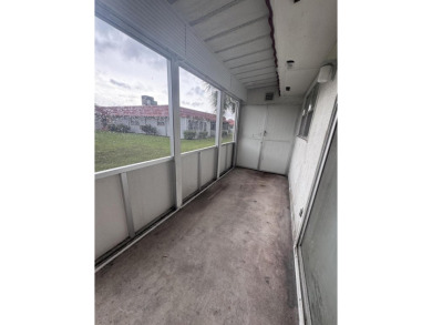 Two-bedroom, 2 bath, end unit villa in the Seville section of on Kings Point Golf - Executive in Florida - for sale on GolfHomes.com, golf home, golf lot