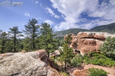 1 acre- AMAZING COLORADO VIEWS in this timbered natural setting on Perry Park Country Club in Colorado - for sale on GolfHomes.com, golf home, golf lot