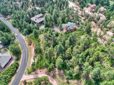 1 acre- AMAZING COLORADO VIEWS in this timbered natural setting on Perry Park Country Club in Colorado - for sale on GolfHomes.com, golf home, golf lot