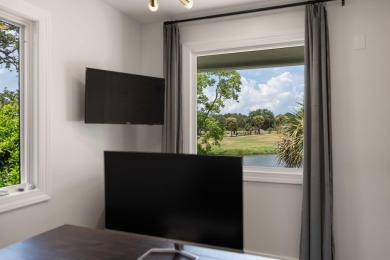 Situated on a beautiful lagoon overlooking the Wild Dunes Harbor on Wild Dunes Harbor Golf Resort in South Carolina - for sale on GolfHomes.com, golf home, golf lot