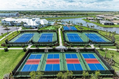 Exquisite Florida Resort Living in Lorraine Lakes. Discover on Lakewood National Golf Club in Florida - for sale on GolfHomes.com, golf home, golf lot