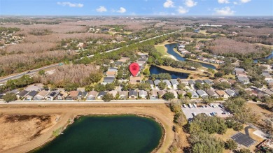 Under contract-accepting backup offers. Charming 3-Bedroom Home on TPC of Tampa Bay in Florida - for sale on GolfHomes.com, golf home, golf lot