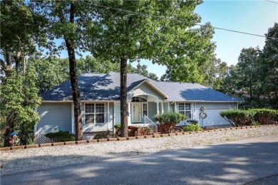 Discover the charm and elegance of this beautiful 2,452 sq ft on Holiday Island Golf Course in Arkansas - for sale on GolfHomes.com, golf home, golf lot