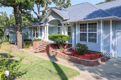 Discover the charm and elegance of this beautiful 2,452 sq ft on Holiday Island Golf Course in Arkansas - for sale on GolfHomes.com, golf home, golf lot