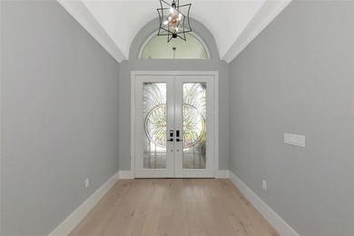 **BRILLIANTLY UPDATED, MOVE-IN READY, GOLF COURSE ESTATE in the on The Oaks Club in Florida - for sale on GolfHomes.com, golf home, golf lot