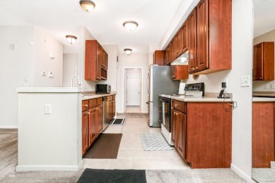 Welcome to this inviting, corner unit condominium, thoughtfully on Fellows Creek Golf Club in Michigan - for sale on GolfHomes.com, golf home, golf lot