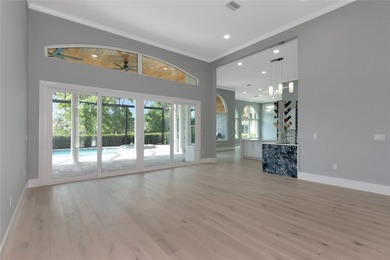 **BRILLIANTLY UPDATED, MOVE-IN READY, GOLF COURSE ESTATE in the on The Oaks Club in Florida - for sale on GolfHomes.com, golf home, golf lot