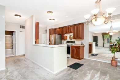 Welcome to this inviting, corner unit condominium, thoughtfully on Fellows Creek Golf Club in Michigan - for sale on GolfHomes.com, golf home, golf lot