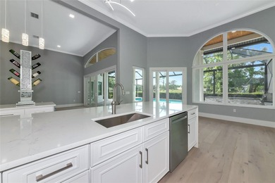 **BRILLIANTLY UPDATED, MOVE-IN READY, GOLF COURSE ESTATE in the on The Oaks Club in Florida - for sale on GolfHomes.com, golf home, golf lot