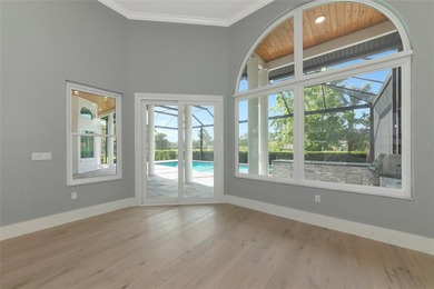 **BRILLIANTLY UPDATED, MOVE-IN READY, GOLF COURSE ESTATE in the on The Oaks Club in Florida - for sale on GolfHomes.com, golf home, golf lot
