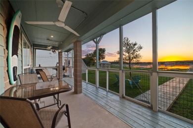 The back porch to this lake house has some of the prettiest on Hideout Golf Club and Resort  in Texas - for sale on GolfHomes.com, golf home, golf lot