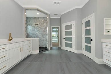 **BRILLIANTLY UPDATED, MOVE-IN READY, GOLF COURSE ESTATE in the on The Oaks Club in Florida - for sale on GolfHomes.com, golf home, golf lot