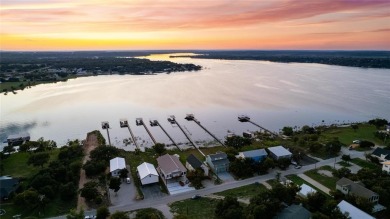 The back porch to this lake house has some of the prettiest on Hideout Golf Club and Resort  in Texas - for sale on GolfHomes.com, golf home, golf lot