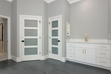**BRILLIANTLY UPDATED, MOVE-IN READY, GOLF COURSE ESTATE in the on The Oaks Club in Florida - for sale on GolfHomes.com, golf home, golf lot