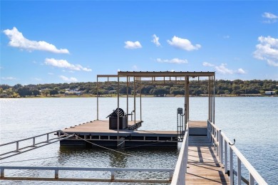 The back porch to this lake house has some of the prettiest on Hideout Golf Club and Resort  in Texas - for sale on GolfHomes.com, golf home, golf lot