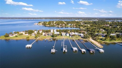 The back porch to this lake house has some of the prettiest on Hideout Golf Club and Resort  in Texas - for sale on GolfHomes.com, golf home, golf lot