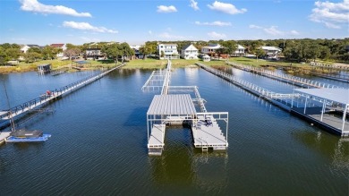 The back porch to this lake house has some of the prettiest on Hideout Golf Club and Resort  in Texas - for sale on GolfHomes.com, golf home, golf lot