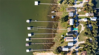 The back porch to this lake house has some of the prettiest on Hideout Golf Club and Resort  in Texas - for sale on GolfHomes.com, golf home, golf lot