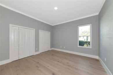 **BRILLIANTLY UPDATED, MOVE-IN READY, GOLF COURSE ESTATE in the on The Oaks Club in Florida - for sale on GolfHomes.com, golf home, golf lot