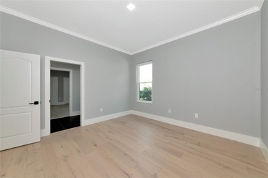 **BRILLIANTLY UPDATED, MOVE-IN READY, GOLF COURSE ESTATE in the on The Oaks Club in Florida - for sale on GolfHomes.com, golf home, golf lot