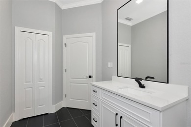 **BRILLIANTLY UPDATED, MOVE-IN READY, GOLF COURSE ESTATE in the on The Oaks Club in Florida - for sale on GolfHomes.com, golf home, golf lot