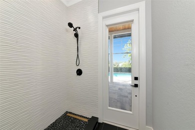 **BRILLIANTLY UPDATED, MOVE-IN READY, GOLF COURSE ESTATE in the on The Oaks Club in Florida - for sale on GolfHomes.com, golf home, golf lot