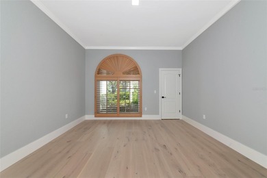 **BRILLIANTLY UPDATED, MOVE-IN READY, GOLF COURSE ESTATE in the on The Oaks Club in Florida - for sale on GolfHomes.com, golf home, golf lot